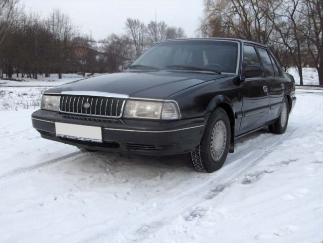 Kia Concord 2.0 MT (99 л.с.) -  1987 – 1995, седан