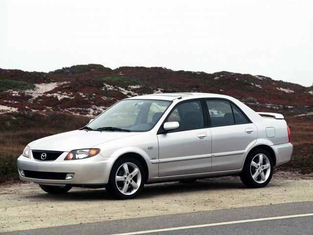 Mazda Protege 1.6 MT (106 л.с.) - III (BJ) 1998 – 2004, седан