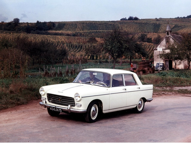 Peugeot 404 2.0D MT (64 л.с.) -  1960 – 1975, седан