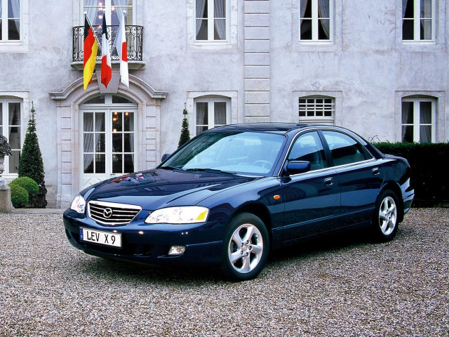 Mazda I Рестайлинг седан 2000-2003