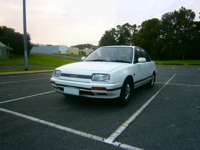 Daihatsu Applause 1.6 MT (97 л.с.) - I 1989 – 1997, лифтбек